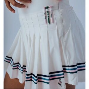 White Pleated Skirt with Striped Hem
